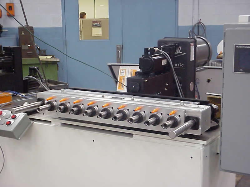 Ball Screw unit with inline 9spindle head with GB Brackets Hause Machines